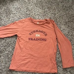 Cotton on teenager in training shirt size 5